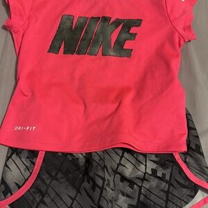 Nike Vibrant Pink Dri-FIT Tee with Bold Black Logo